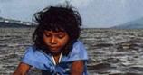 Girl washing clothes in Lake Managua, by Bill Gentile © 2010 Bill Gentile